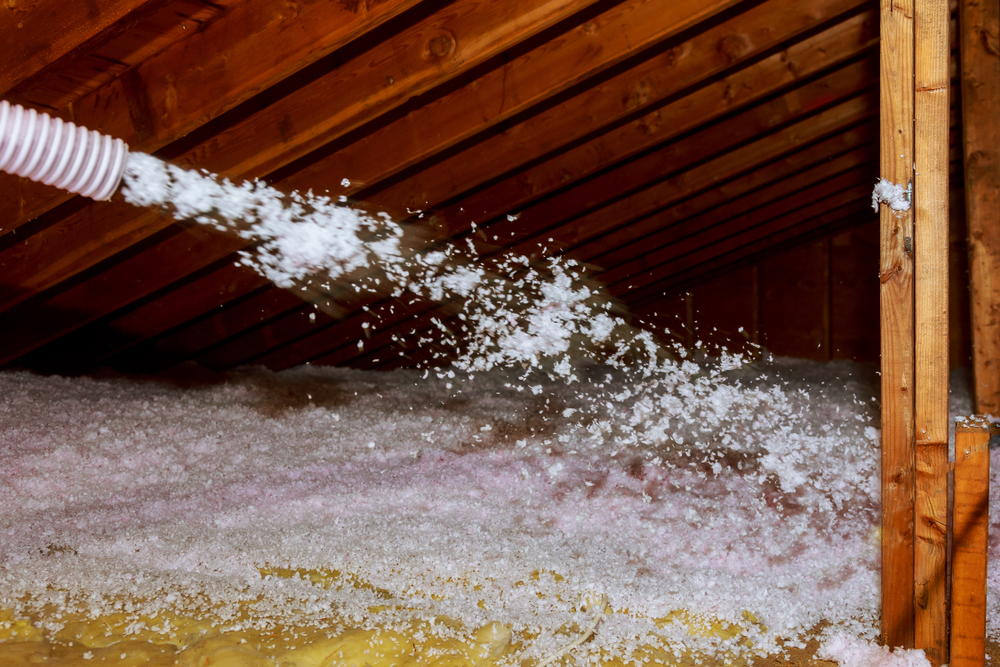 Worker,Spraying,Mineral,Rock,Wool,Of,House,Attic,Insulation